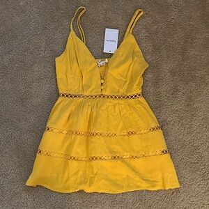 NanaMacs Yellow Spaghetti strap Mini Romper
